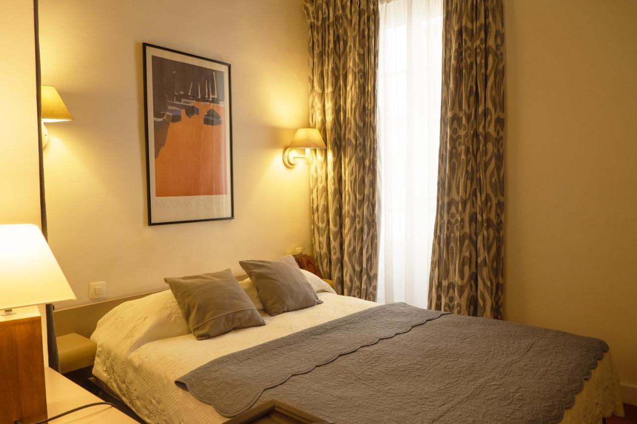 Hotel Du Cygne Parigi Esterno foto