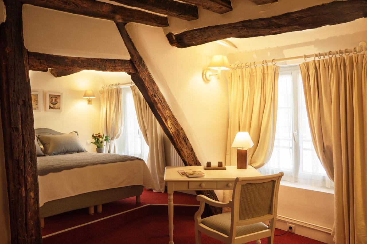 Hotel Du Cygne Parigi Esterno foto